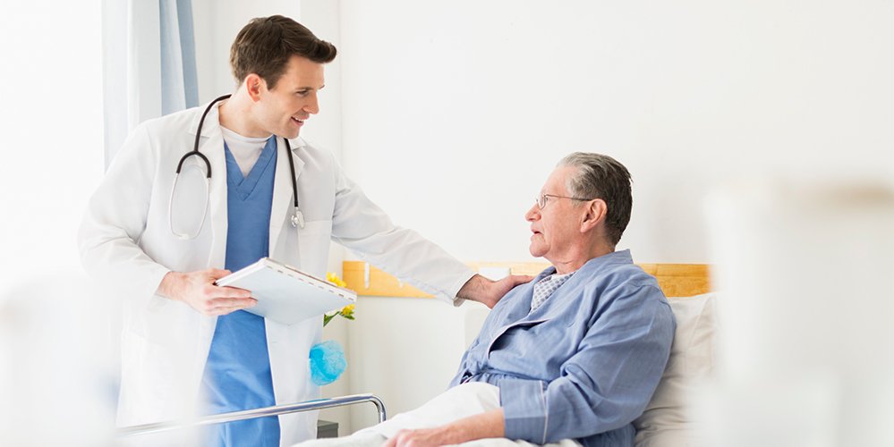 A doctor talking to a patient